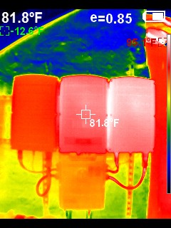 Infrared thermal image of three enclosures with fairly even thermal signatures around 81.8°F