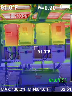 Infrared thermal image of a row of four enclosures with a max/min readout of 130.2°F and 84.0°F