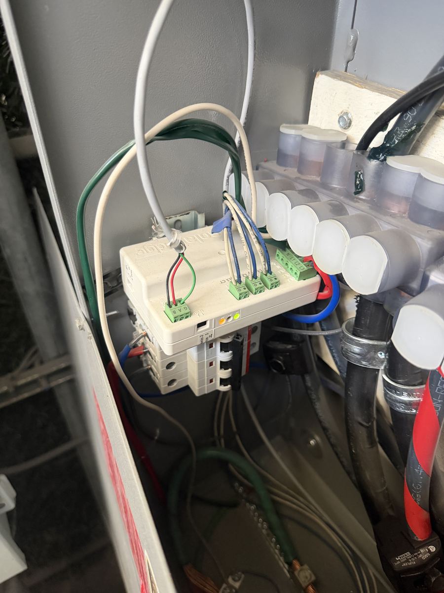 SolarEdge monitoring and communication device wired into an electrical panel
